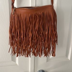 Tan fringed crossbody bag